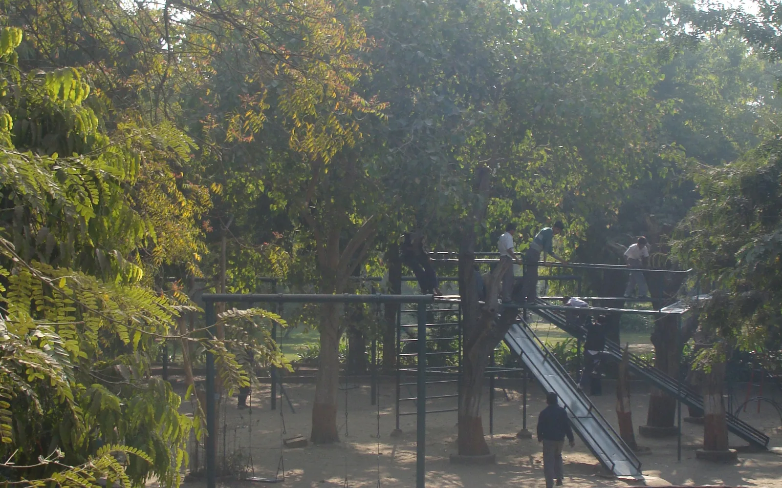 Community play area and recreation space showing family-friendly park design